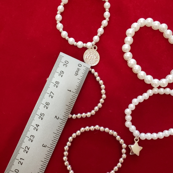 Multiple silver and white tone faux Pearl bracelets with charms - Picture 6 of 7